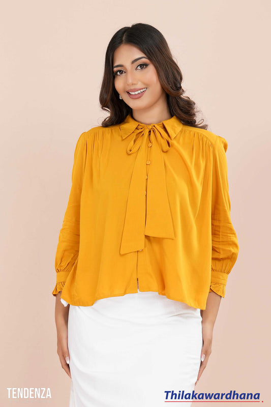 Tendenza Bow Tie Neck Ruffle Hem Blouse