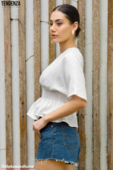 Tendenza V Neck Smocked Peplum Top