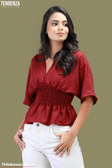 Tendenza V Neck Smocked Peplum Top