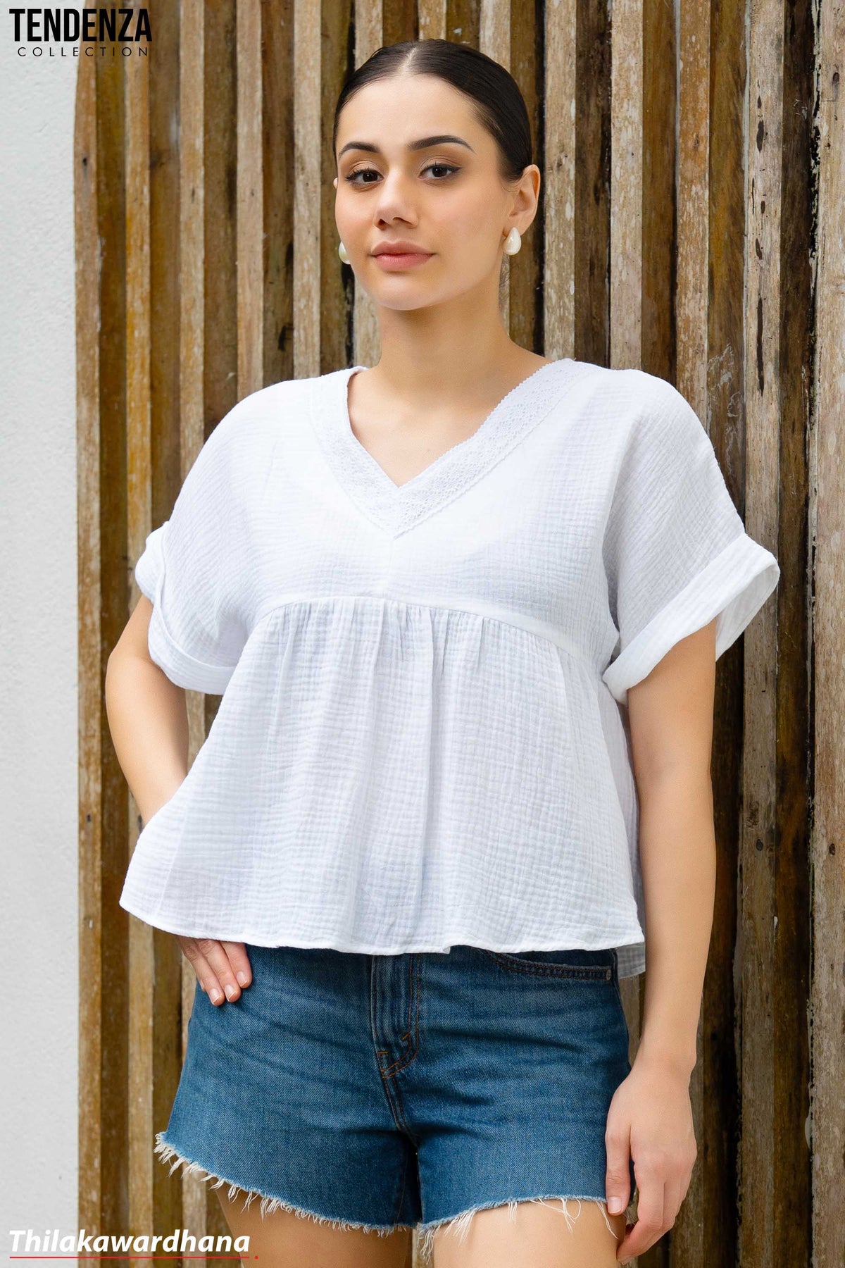 Tendenza V Neck Babydoll Peplum Top