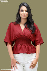 Tendenza V Neck Smocked Peplum Top