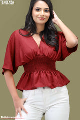 Tendenza V Neck Smocked Peplum Top